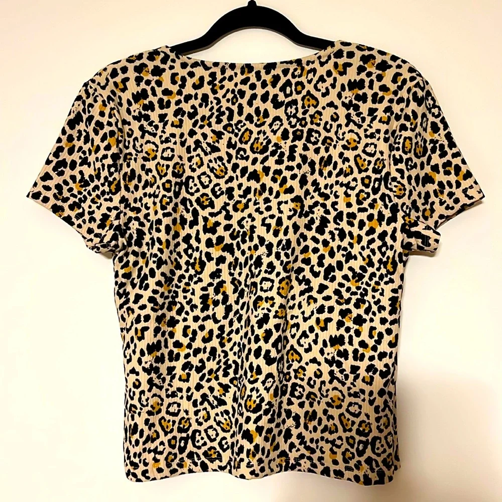 Leopard Print V Neck Wrap Top. Size XL, runs S to M. Spandex. NWOT.